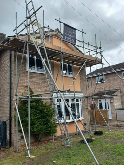 Full-height residential scaffolding for house extension project