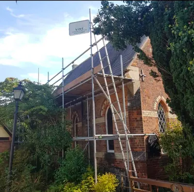 Tube and clip scaffolding for roof replacement